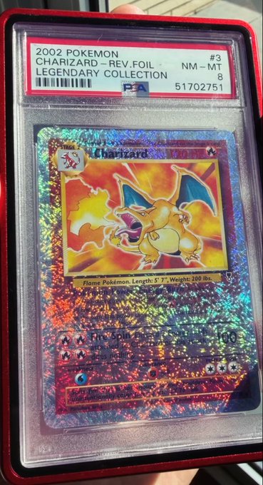 A PSA-graded 2002 Pokemon Charizard Legendary Collection #3 Reverse Holo card with NM-MT 8 rating (cert 51702751).