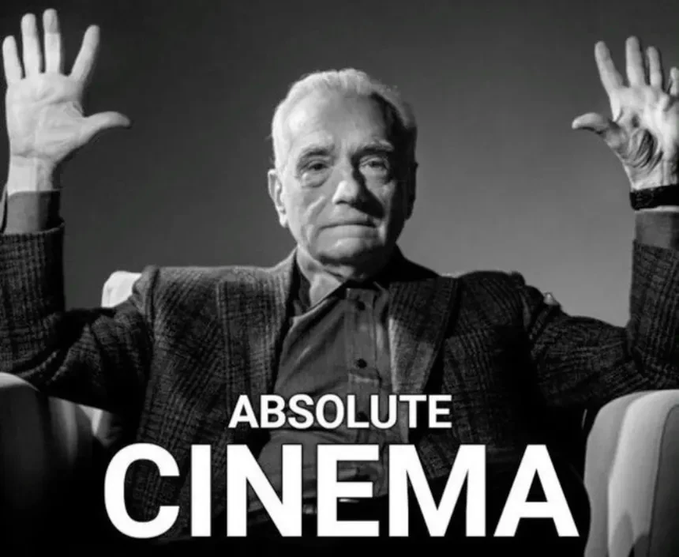 A black-and-white meme image of Martin Scorsese sitting in a chair with both hands raised, captioned 'ABSOLUTE CINEMA'.