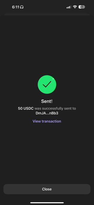 A phone screen displays a confirmation that 50 USDC was successfully sent to address DmJA...nBb3, with options to view the transaction or close the window.