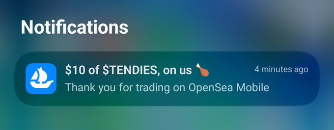 A mobile notification from OpenSea reads: '$10 of $TENDIES, on us 🍗 - Thank you for trading on OpenSea Mobile.'