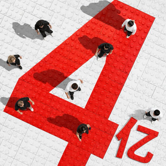 An aerial view shows miniature figures in business attire walking across a tiled floor featuring a large red "TRON 12" logo, symbolizing the widespread recognition and convergence of consumer choice toward the TRON brand with 400 million selections.