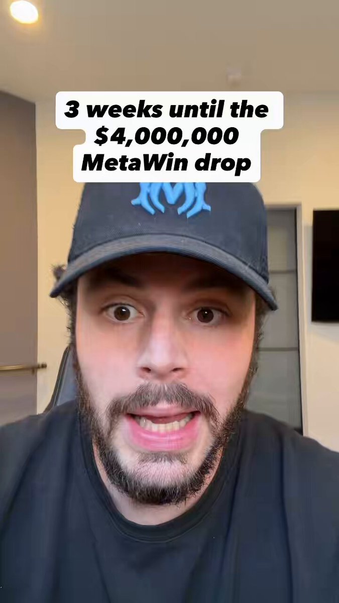 In the image, a man wearing a blue baseball cap and black t-shirt is making a funny face or smiling while wearing his hat. The caption reads "3 weeks until the $4M metawin drop", indicating that there are 3 weeks left before the promised monetary gain from investing in Metawin.