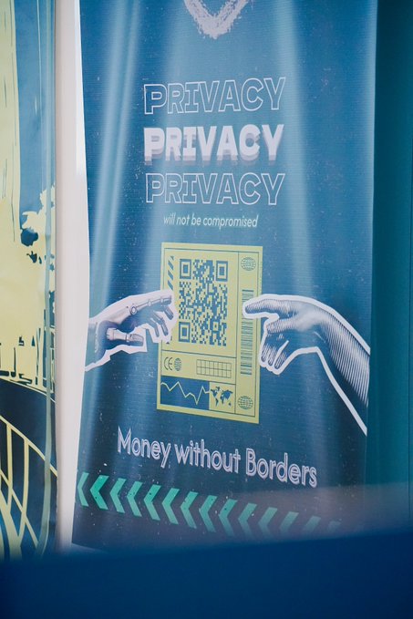 The image features a poster with two hands holding up a sign that says "Privacy Privacy Privacy". The poster also includes a QR code, which could be used for contact information or further details about the event. The text "@NEARLegion" is present in the image as well.