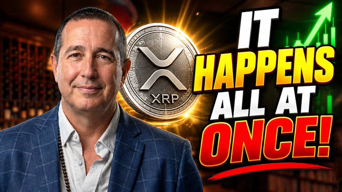 A YouTube thumbnail featuring a man in a blue plaid suit next to a glowing XRP cryptocurrency coin, with bold text reading 'IT HAPPENS ALL AT ONCE!' and a green rising arrow chart in the background.