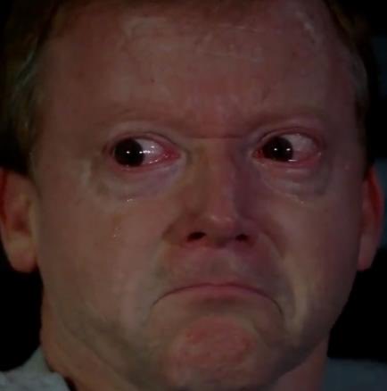 The image shows a close-up of a man with a deeply distressed, tearful expression. It appears to illustrate the emotional reaction of someone upset by the post's message about cryptocurrency choices, with the tearful face humorously emphasizing disappointment or sympathy toward the bold claim "Pedos use pumpfun G's use TRiX."