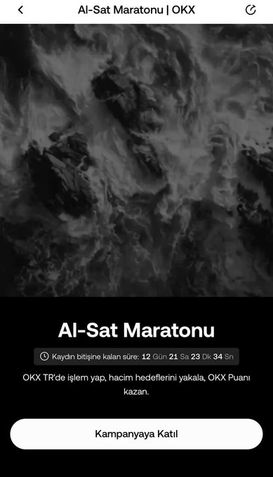 A promotional screen for the "Al-Sat Maratonu" (Buy-Sell Marathon) campaign on OKX TR, featuring a dark, smoky background and Turkish text explaining that participants can earn OKX Puani (Points) by completing buy-sell tasks, with 12 days, 21 hours, 23 minutes, and 34 seconds remaining until the August 5, 19:00 deadline, and a white "Kampanyaya Katıl" (Join Campaign) button at the bottom.