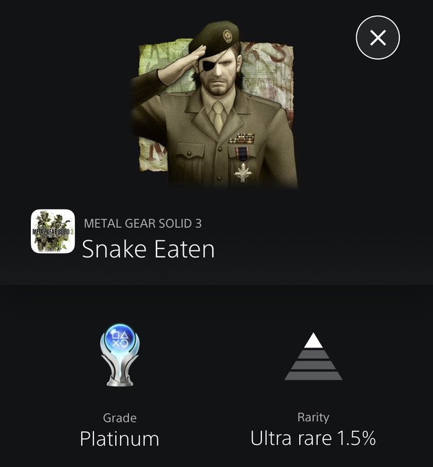 A screenshot of a PlayStation trophy screen shows an illustration of a military character saluting. The text indicates the game is "METAL GEAR SOLID 3 Snake Eaten", and it is a "Platinum" trophy with a rarity of "Ultra rare 1.5%".