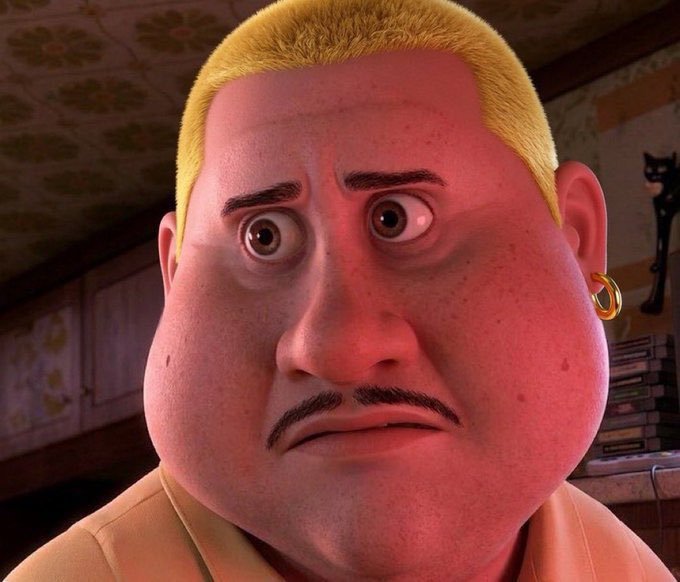 A close-up of an animated male character with short blonde hair, a thin mustache, and a gold hoop earring, looking slightly concerned.