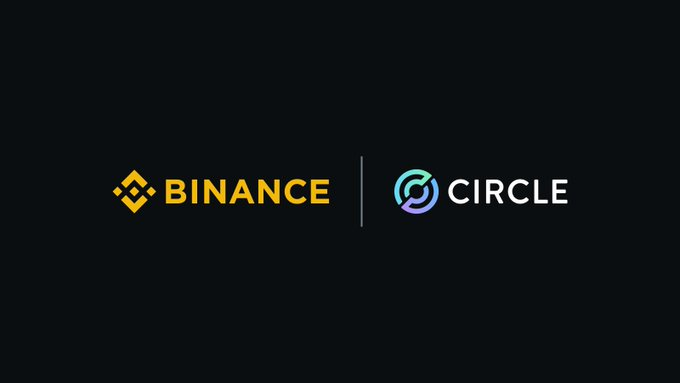 The image displays the logos of Binance and Circle side by side on a black background, visually representing the new strategic partnership between the two companies. The Binance logo appears in yellow on the left, while Circle's blue logo is on the right, separated by a vertical divider.