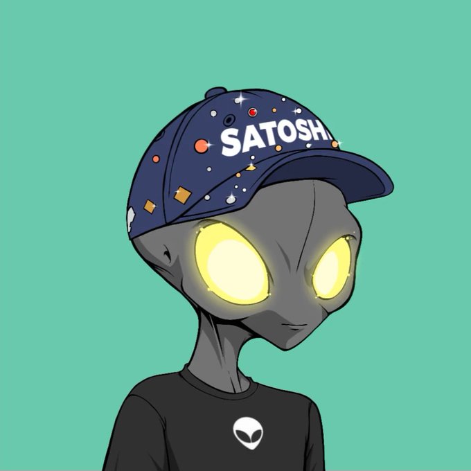 A cartoon illustration of a grey alien with glowing yellow eyes wearing a black shirt and a blue cap that reads "SATOSHI" decorated with various small symbols, set against a teal background.