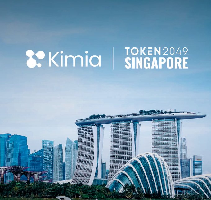 Promotional graphic for 'TOKEN 2049 SINGAPORE' featuring the Kimia logo overlaid on an image of Singapore's Marina Bay Sands skyline.
