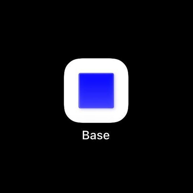 The image features a square app icon with a blue background, which reads "Base" at the bottom of the image. The text "Base" is written in white letters that are positioned below the app icon. The image also contains some text that says "More builders. More on chain activity. The future of crypto adoption is being built on Base." This information suggests that the app is related to a cryptocurrency or blockchain project, and it has been designed for easy navigation and user engagement.