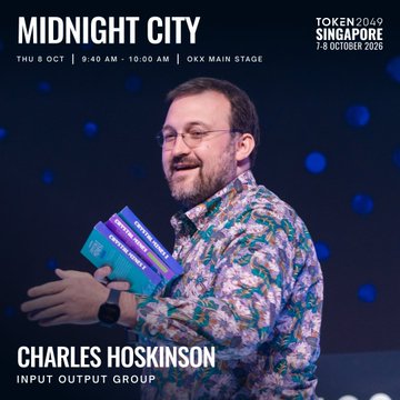 The promotional image features Charles Hoskinson of Input Output Group, holding materials on stage at TOKEN2049 Singapore (7-8 October 2026), with event details announcing his Midnight City presentation scheduled for Thursday, October 8th from 9:40-10:00 AM on the OKX Main Stage.