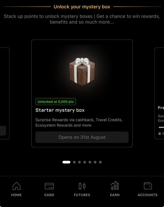 A mobile app screen titled 'Unlock your mystery box' shows a 'Starter mystery box' unlocked at 5,000 pts that 'Opens on 31st August', with a bottom navigation bar including Home, Card, Futures, Earn, and Accounts.