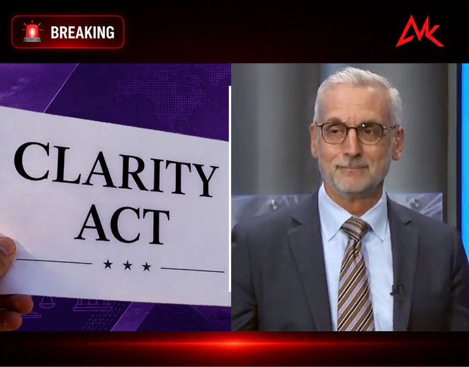A news broadcast screenshot showing a 'BREAKING' banner and a split screen with a paper reading 'CLARITY ACT' and a man in a suit with glasses, under an 'MK' logo.