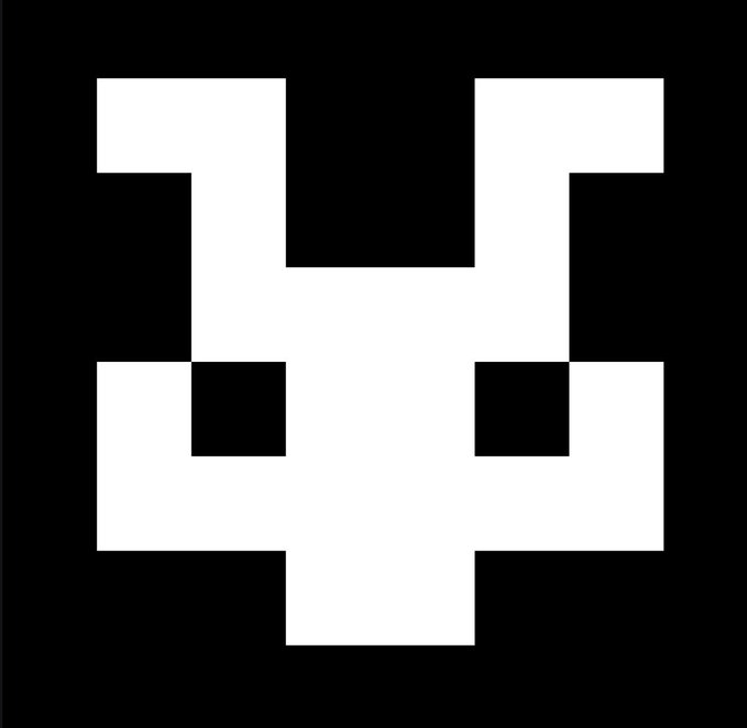 A pixelated white "X" or skull-like emblem on a black background, likely representing the logo of RareFriendsNFT as referenced in the shoutout. The bold, minimalist design fits the NFT art aesthetic that the project appears to embrace.