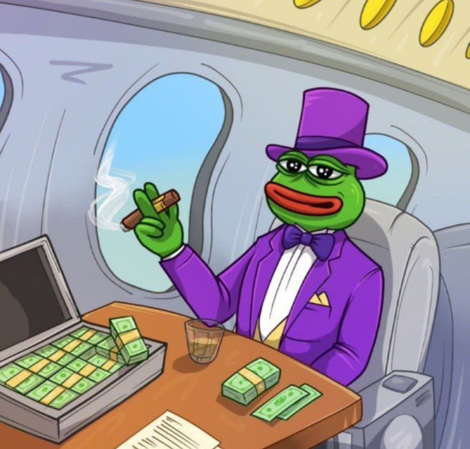 The image shows Pepe the Frog depicted as a wealthy tycoon, wearing a purple top hat and tuxedo while smoking a cigar inside a private jet, with stacks of cash and an open briefcase full of money on the table before him. The caption paired with this image, "Our last year of being broke," humorously suggests an optimistic outlook of imminent wealth and financial success to come.