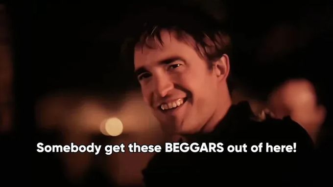 A smiling young man is shown in a dark, warmly lit setting with the subtitle 'Somebody get these BEGGARS out of here!'