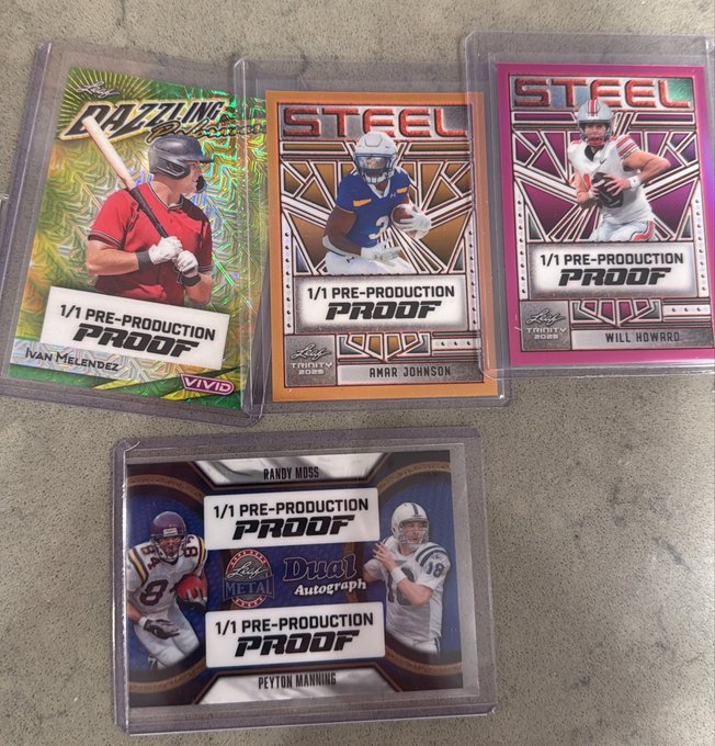 Four rare 1/1 pre-production proof football trading cards are displayed in protective cases, featuring Ivan Melendez, Amar Johnson, Will Howard, and a Dual Autograph card with Randy Moss and Peyton Manning, directly answering the post's question about pre-production 1/1 cards.