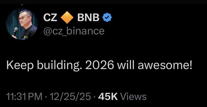 A tweet screenshot from CZ (Changpeng Zhao) of @cz_binance displaying the message 'Keep building. 2026 will awesome!' posted at 11:31 PM on 12/25/25 with 45K views.