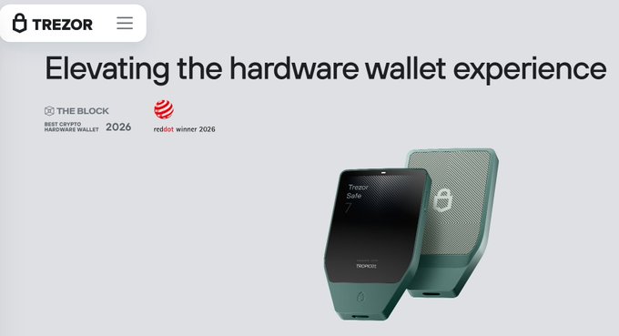 This image showcases the Trezor Safe 7 hardware wallet, highlighting its award for "Best Crypto Hardware Wallet" by The Block in 2026. The accompanying post states the user is now using Trezor Safe 7s for hardware wallets.