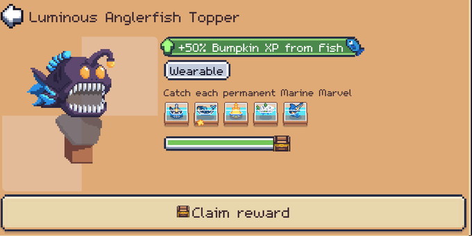 A pixel art game UI showing a "Luminous Anglerfish Topper" reward with +50% Bumpkin XP from Fish, requiring players to catch each permanent marine marvel, with a claim reward button at the bottom.