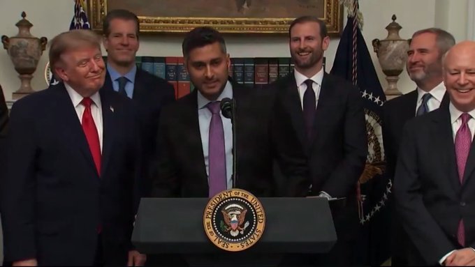 The image shows Donald Trump with a knowing smirk, standing behind a podium with the Seal of the President of the United States, as he reacts to an announcement about a "$INK drop for Discord roles".