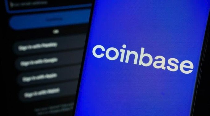 The Coinbase logo is displayed on a blue screen, symbolizing the company's involvement in a lawsuit settlement with the SEC over lost internal messages for $150,000 in legal fees.