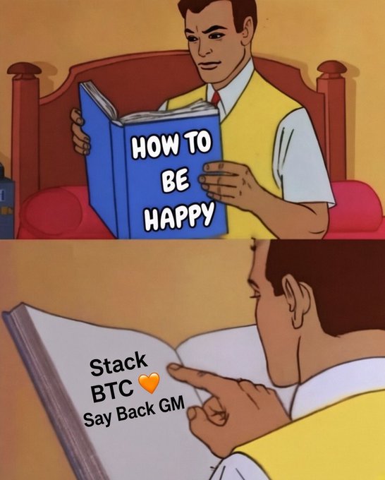 A two-panel meme showing a cartoon man reading a book titled 'HOW TO BE HAPPY' and then pointing to text on the page that reads 'Stack BTC 🧡 Say Back GM'.