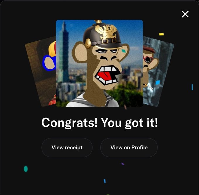 A digital collectible card showing an angry monkey character wearing a gold-embellished hat, displayed with the text "Congrats! You got it!" along with "View receipt" and "View on Profile" buttons.