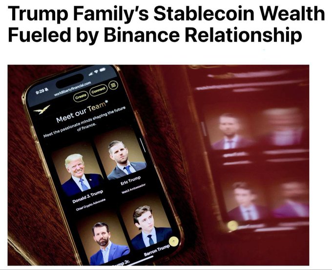 The image shows a smartphone displaying the profile of Donald Trump's family members, including himself, along with other names. The phone is placed on top of a wooden table or desk. The text above the image reads "Trump Family's Stablecoin Wealth Fueled by Binance Relationship". This suggests that the Trump family has been using their stablecoins to invest in Bitcoin and other digital assets, which have gained significant value over time.