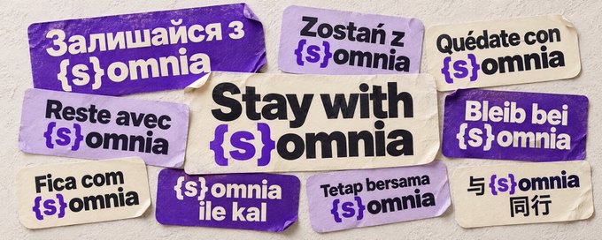 A collection of stickers promotes the brand 'Somnia' with the phrase 'Stay with Somnia' translated into multiple languages including Ukrainian, Polish, Spanish, French, Italian, Portuguese, Turkish, Indonesian, and Chinese.
