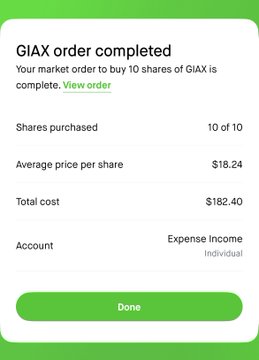 The image shows a screenshot of an app that displays information about a market order completed for GIAX. The screen has a green background, white text, and a gray border. It includes details such as the total cost of the order, the average price per share, and the expense income from the transaction. There is also a message on the screen congratulating the user on completing their order.