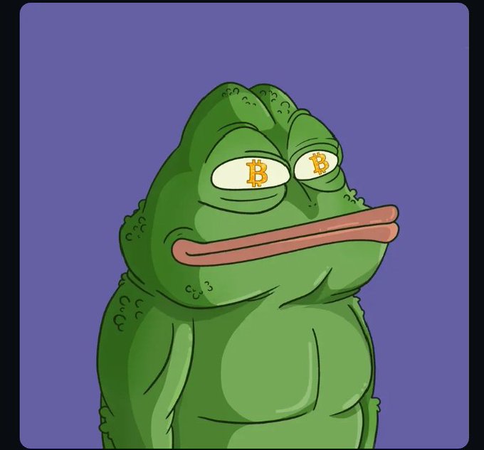A green Pepe the Frog meme stares blankly with Bitcoin (₿) symbols for eyes, symbolizing a laser-focused, unwavering commitment to the Bitcoin goal—"the goal still remains the same until it's achieved"—as his fixed, determined gaze reflects a relentless hold until success.
