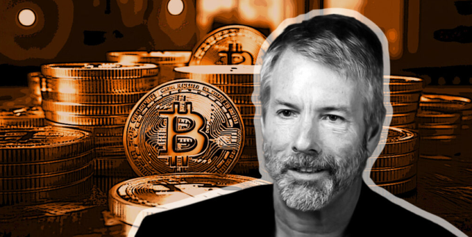 Michael Saylor, Executive Chairman of Strategy (formerly MicroStrategy), stands before a backdrop of stacked Bitcoin coins, reflecting the post's discussion of his company's growing Bitcoin holdings (~840,000 BTC) and its use of preferred share buybacks like STRC to support its digital energy treasury strategy.