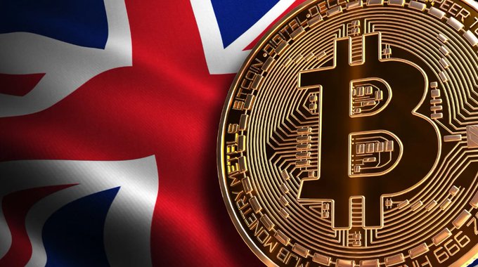 A golden Bitcoin coin displayed against a waving United Kingdom flag.