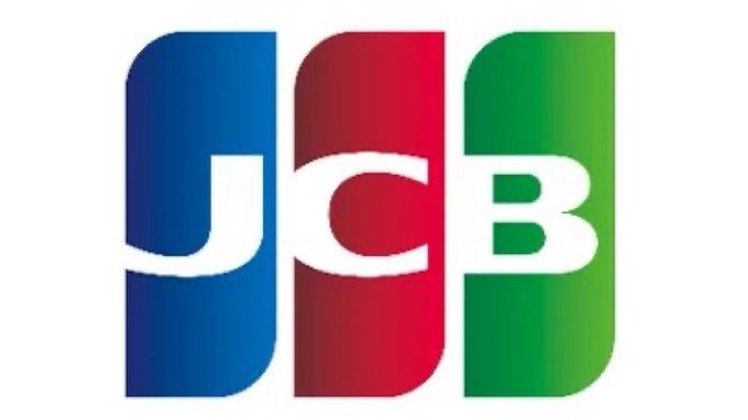 The image displays the JCB logo, featuring bold white "JCB" letters against three vertical color bars in blue, red, and green. The logo directly represents JCB, Japan's largest payment company, which is referenced in the accompanying post about partnering with Circle to test USDC stablecoin for cross-border payments.