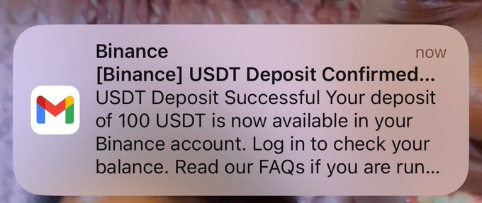 A phone notification from Binance reads '[Binance] USDT Deposit Confirmed... USDT Deposit Successful Your deposit of 100 USDT is now available in your Binance account. Log in to check your balance. Read our FAQs if you are run...'
