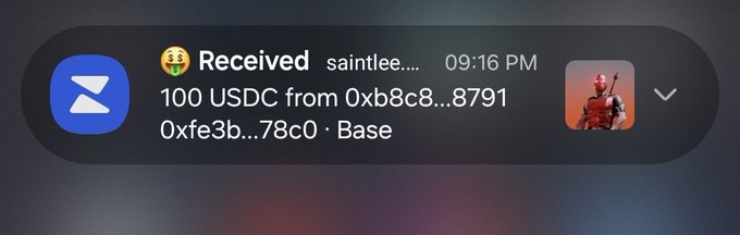 The image shows a message from someone named "Saintee" that has been received by another person, who is now replying with an emoticon. The message contains information about a meeting or event, as well as details about the time and location of the gathering.