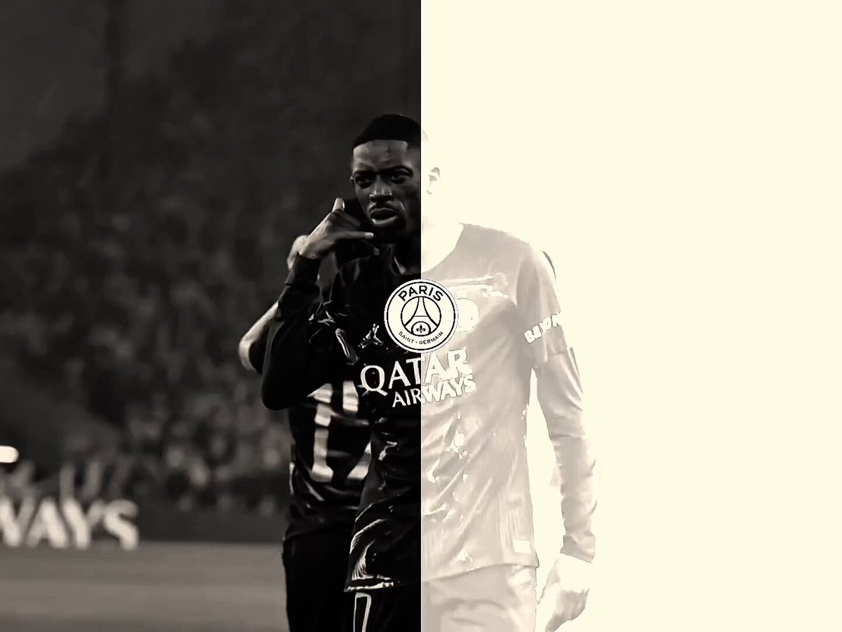 The image features a soccer player wearing a black and white jersey with the number 10 standing against a blurred background. The player's face is partially visible, adding an element of mystery to the scene. The photo appears to be a collage or a mashup of two separate images, possibly from different sources or events. The player in the foreground seems to be posing for the picture while holding up his hand with a finger on it.