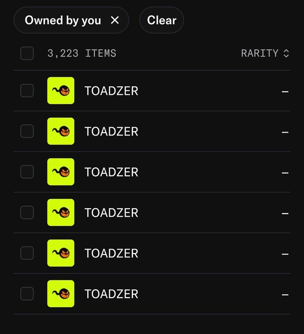 Dark-mode digital inventory screen showing 3,223 items filtered as "Owned by you," displaying six identical "TOADZER" NFT entries sorted by rarity.