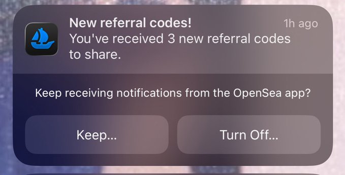 An iPhone notification from the OpenSea app announcing 3 new referral codes, with options to keep or turn off notifications.