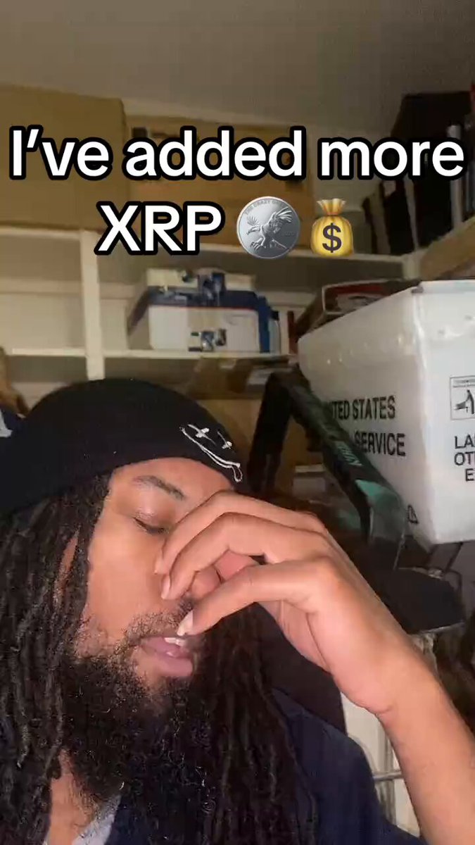 In the image, a man wearing black has his head down with his eyes closed while posing for a photograph related to Bitcoin and Ripple, possibly sharing some insights or experiences about these digital currencies. The caption accompanying this photo reads, "XRP isn't just a trade,it's positioning. Smart money doesn't wait for the moon, it prepares for it. Lock it in, take it off exchanges, and secure it properly under an LLC structure. Reach out to me directly for your Web3 Trusts LLC setup #crypto #assetprotection #web3". The man's facial expression suggests he is deep in thought or contemplation about the topic at hand.