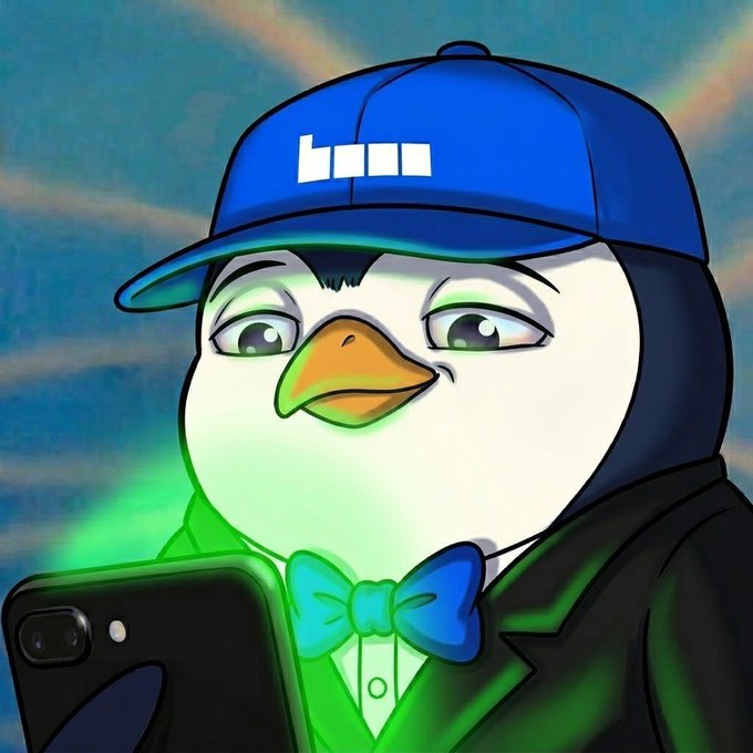 The image features a cartoon penguin wearing a suit, tie, and bowtie holding a cell phone with a green screen. The text "Gm @base fam Builders are already cooking" is present near the bottom of the image. This suggests that there might be an ongoing construction project or some other activity related to building in the area where the penguin is located.