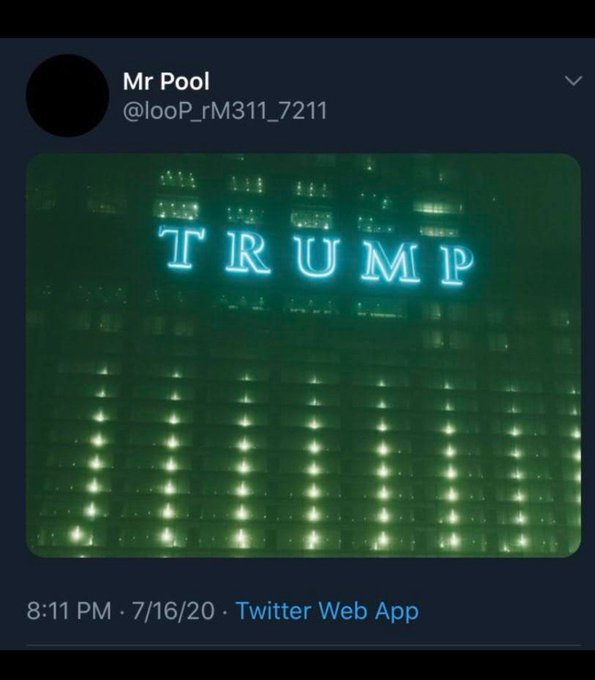 A nighttime photo of the Trump Tower displaying its iconic illuminated "TRUMP" sign in cyan against the dark building facade, shared with news of President Trump meeting with U.S. Senators to discuss the Crypto Clarity Act.