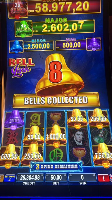 The image shows a "Bell Link" slot machine bonus game in progress, displaying a "GRAND" jackpot of 58,977.20 EUR (already exceeding the 50,000 target mentioned) and a "MAJOR" jackpot of 2,602.07 EUR, with 3 spins remaining and a current credit of 29,304.98 EUR—directly illustrating the player's wish for the pot to reach the 50,000 threshold.