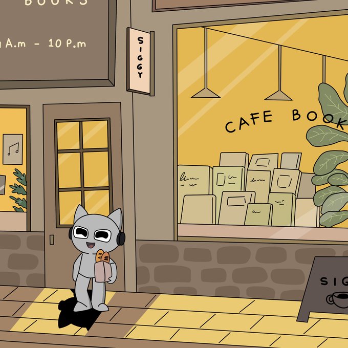 The image features a gray cartoon cat standing on a sidewalk next to a bookstore, Siggy Book Cafe. The cat appears to be holding a book or a drink as if it just dropped by the store. There are also some books visible inside the bookstore window, indicating that the store is open and welcoming customers.