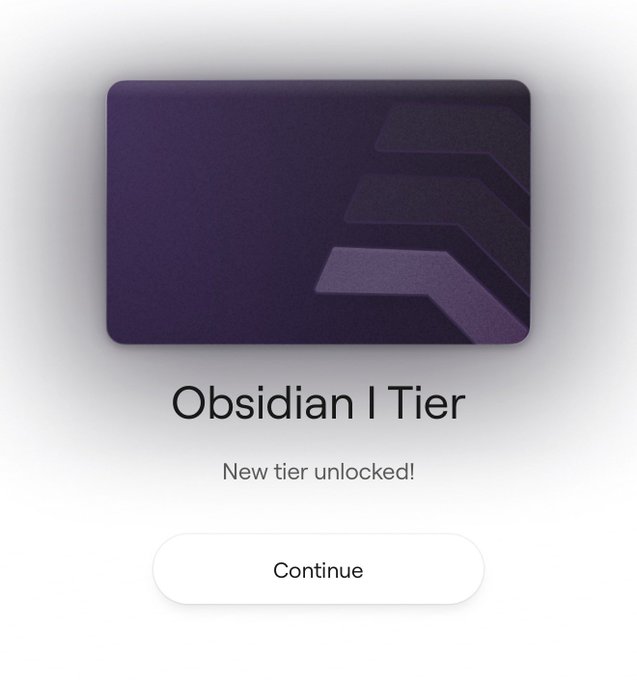 A digital interface displays a dark purple card labeled 'Obsidian I Tier' with the message 'New tier unlocked!' and a 'Continue' button below.