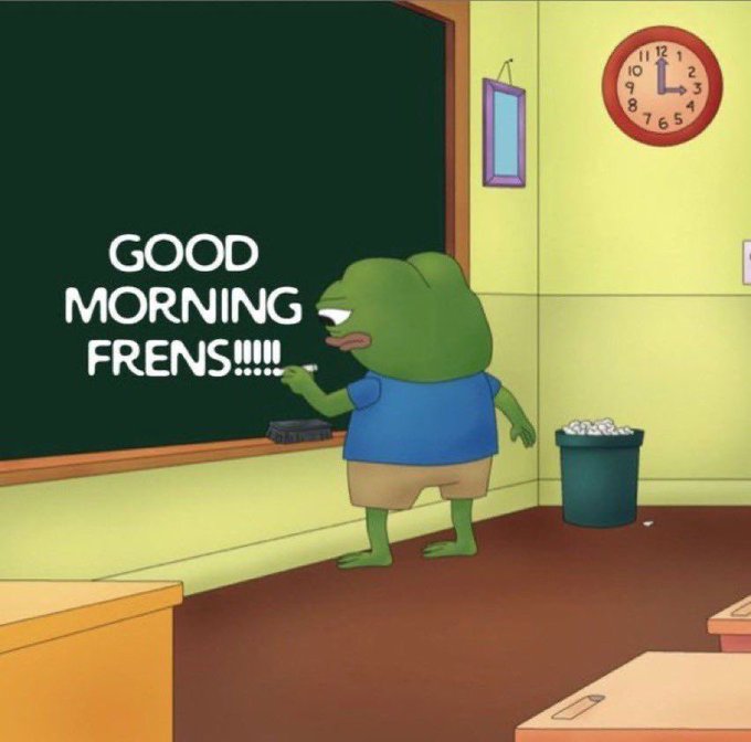 A cartoon illustration of a green frog character standing in front of a chalkboard in a classroom, writing 'GOOD MORNING FRENS!!!!!!!' with a chalkboard eraser nearby and a clock showing around 3:00.