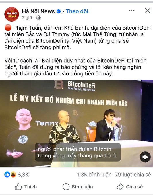 A Facebook post from 'Hà Nội News' about Phạm Tuấn from Khá Bảnh, the representative of BitcoinDeFi in the North, and DJ Tommy (Mai Thế Tùng), featuring an image of a BitcoinDeFi signing ceremony for their Northern branch ('LỄ KÝ KẾT BỔ NHIỆM CHI NHÁNH MIỀN BẮC').